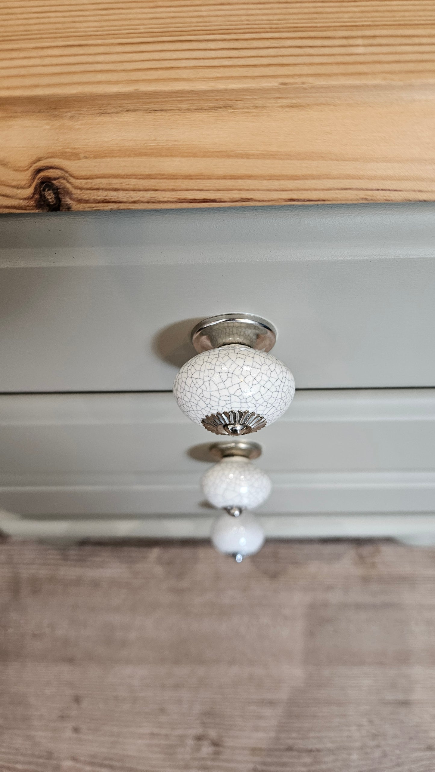 A pair of pine bedside tables painted in Frenchic 'Salt of the Earth'