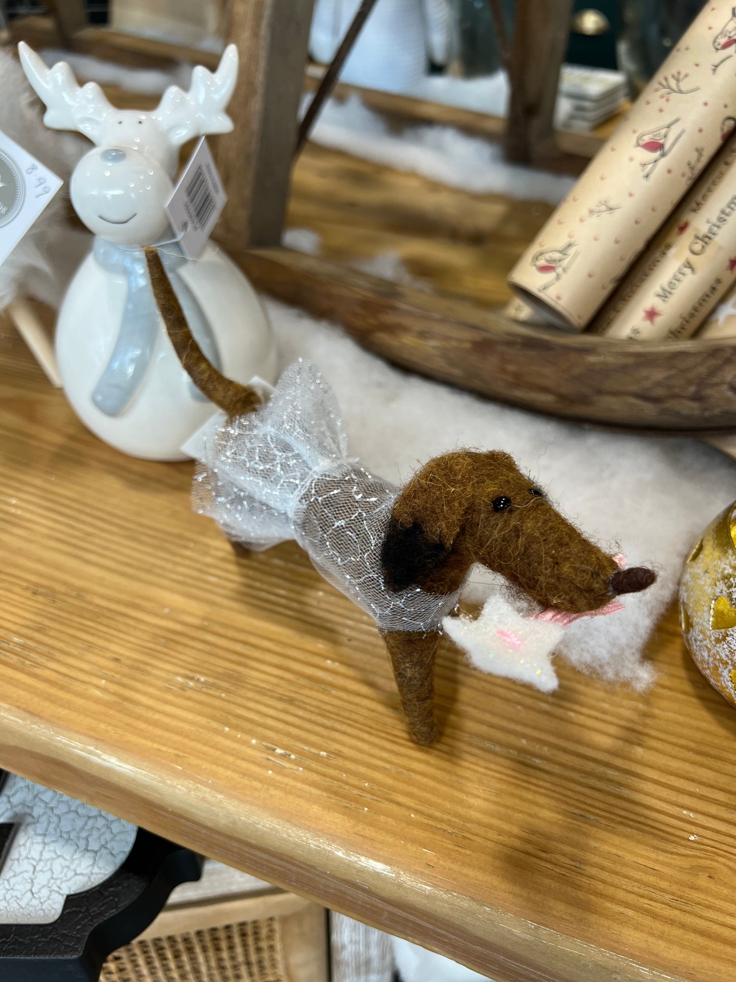 Tutu wearing woolen sausage dog