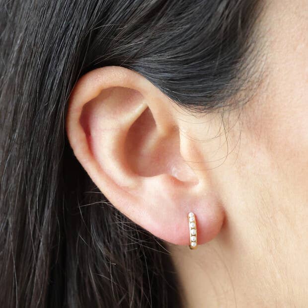 Pearl Studded Huggie Hoop Earrings in Gold