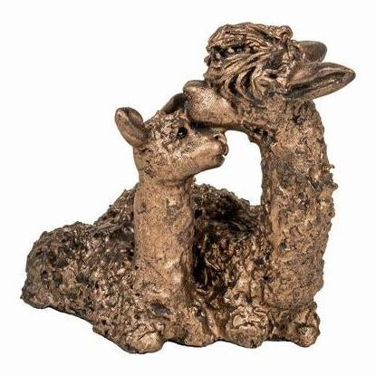 Alpaca pair sitting sculpture