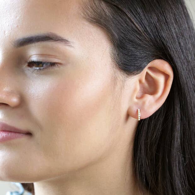 Pearl Studded Huggie Hoop Earrings in Gold